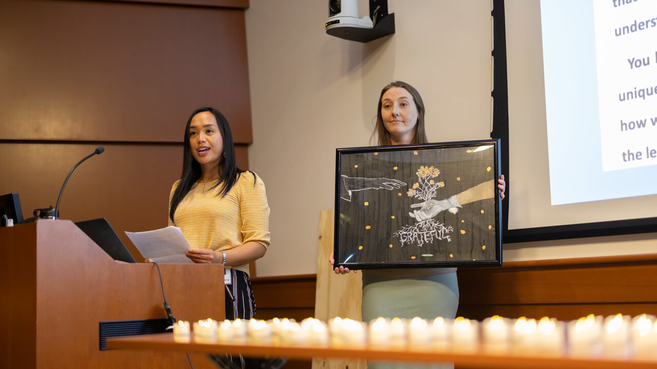Students of the School of Medicine give presentations during the annual ceremony of gratitude.