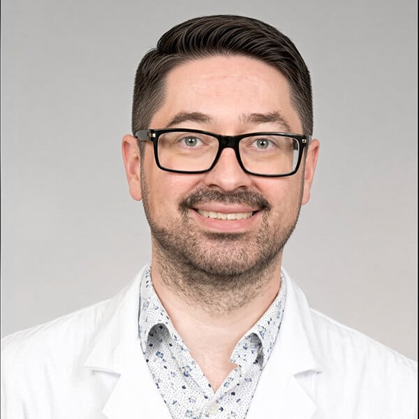 Headshot of anton gryaznov